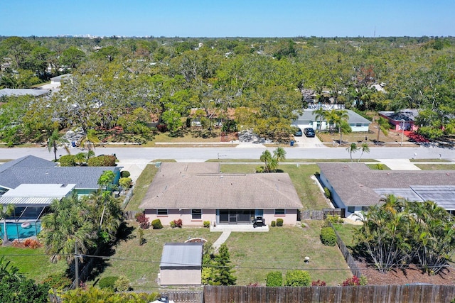 bird's eye view featuring a view of trees