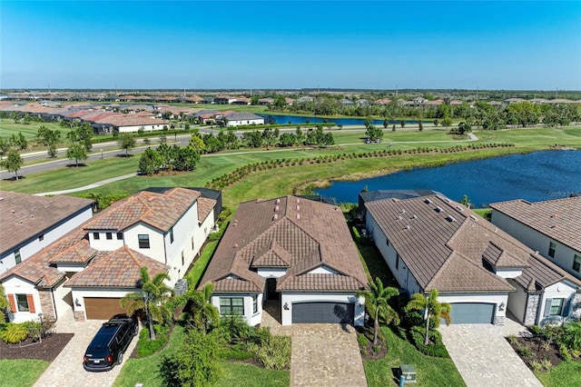 aerial view with a water view and a residential view