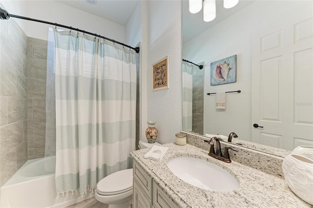 full bathroom featuring vanity, toilet, and shower / bath combo with shower curtain