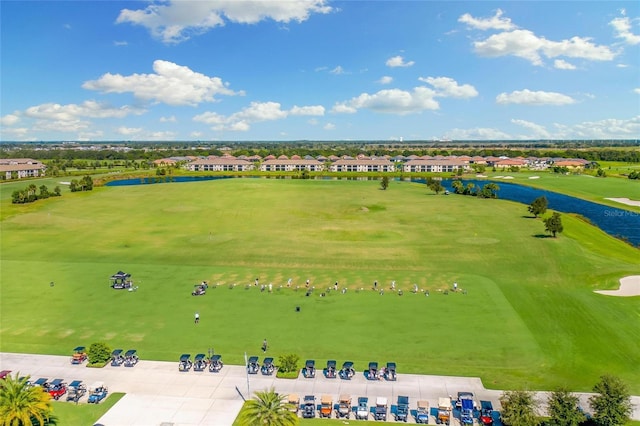 bird's eye view with view of golf course