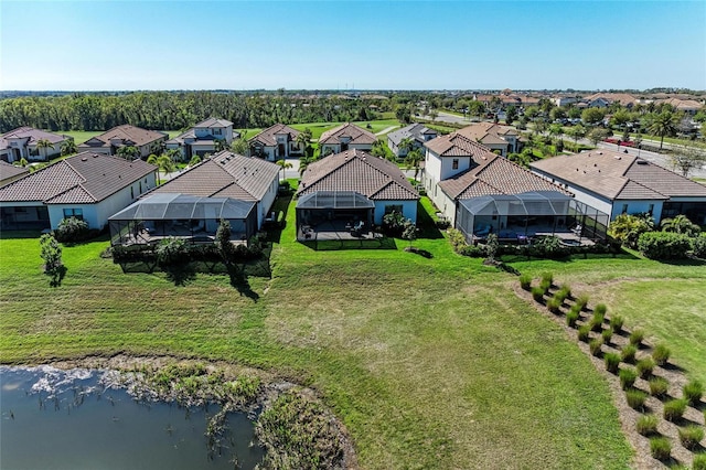 birds eye view of property with a residential view