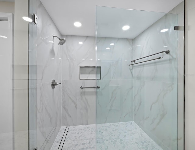 full bathroom with a shower stall