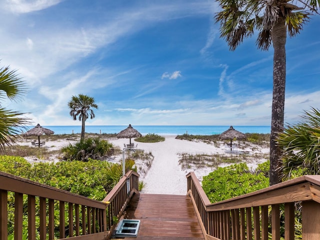 view of water feature with a beach view