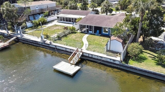 bird's eye view with a water view