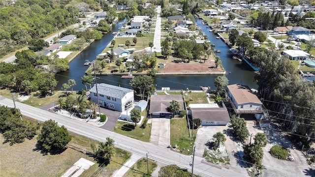 aerial view with a residential view and a water view