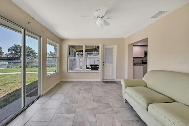 unfurnished sunroom with visible vents