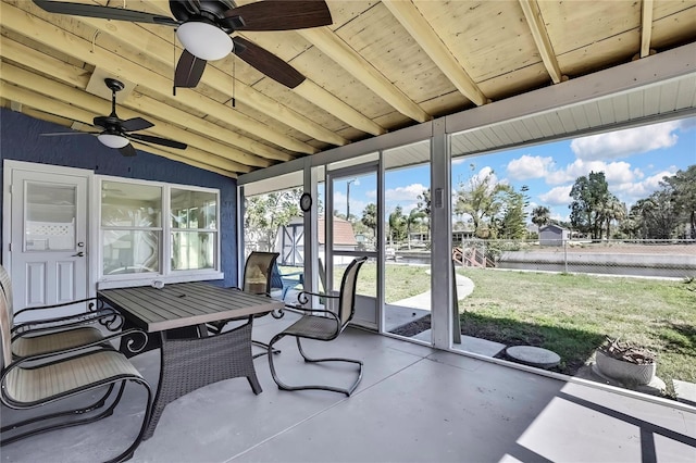 sunroom / solarium with ceiling fan