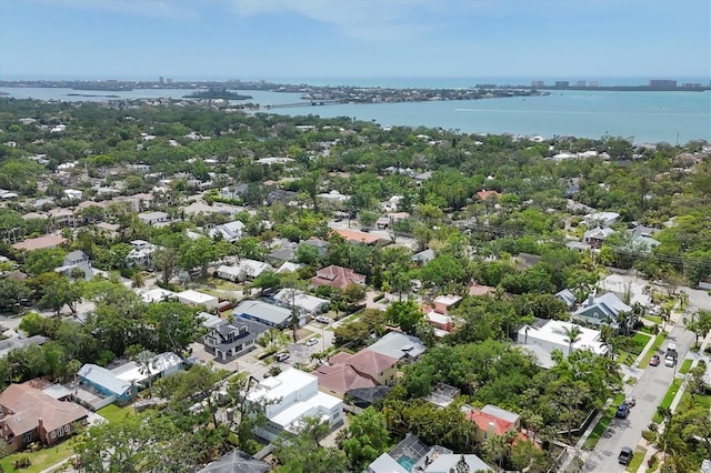 bird's eye view featuring a water view and a residential view