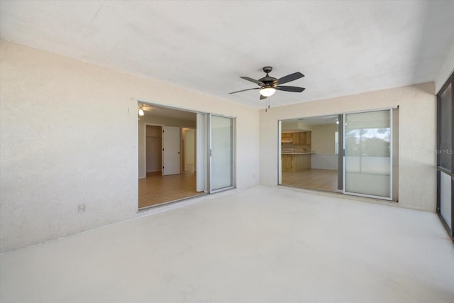 view of patio / terrace featuring ceiling fan