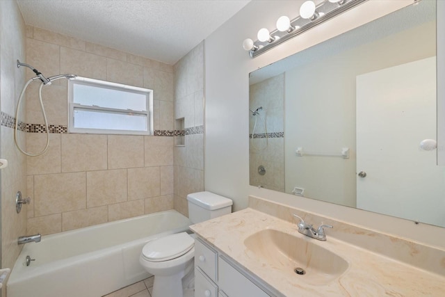 bathroom featuring toilet, a textured ceiling, tile patterned flooring, shower / bath combination, and vanity