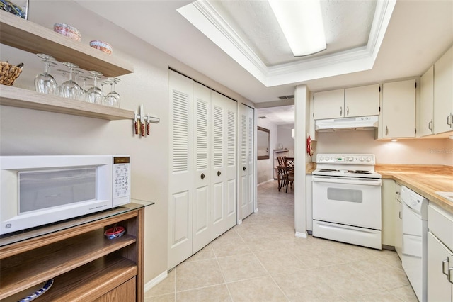 kitchen with crown molding, under cabinet range hood, white appliances, a raised ceiling, and open shelves