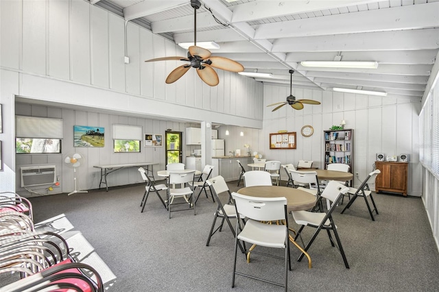 carpeted dining room with lofted ceiling with beams, an AC wall unit, and a ceiling fan