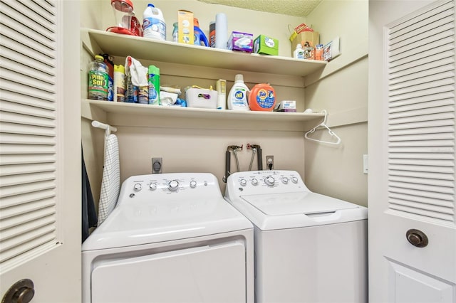 laundry room featuring laundry area and separate washer and dryer