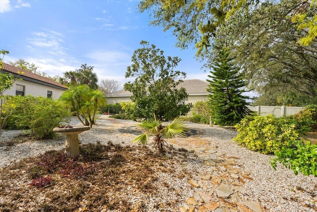 view of yard with fence