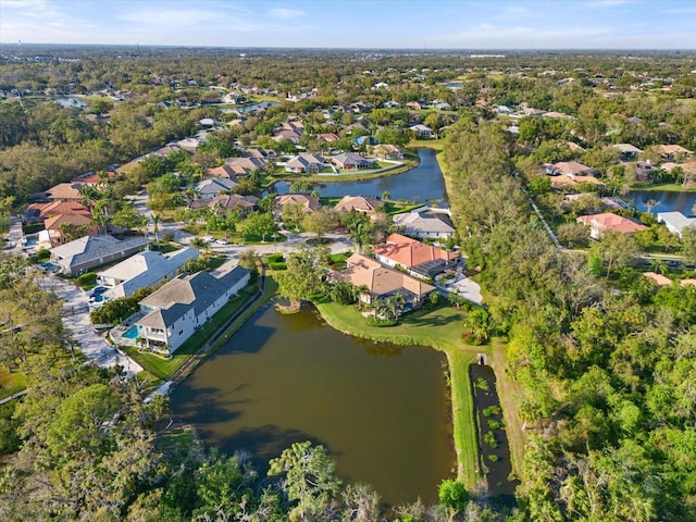 birds eye view of property featuring a residential view and a water view