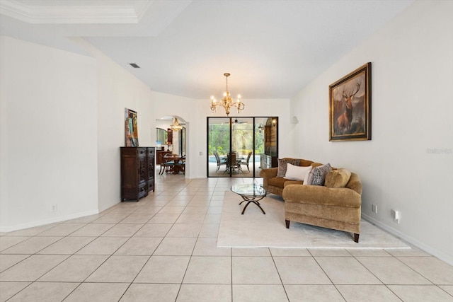 living room with visible vents, baseboards, light tile patterned flooring, arched walkways, and a notable chandelier