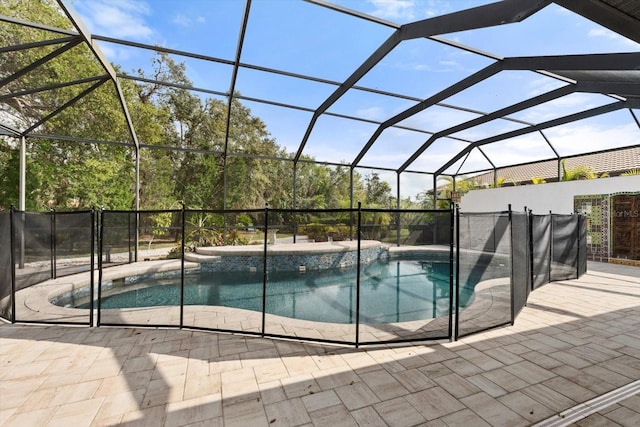 view of pool featuring a lanai, a fenced in pool, and a patio