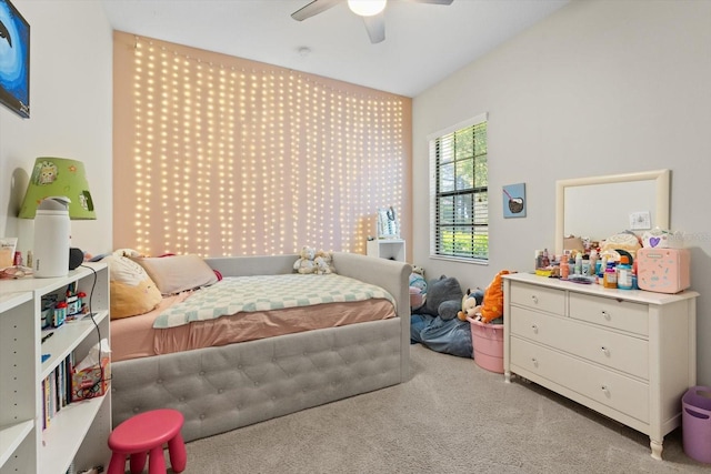 carpeted bedroom with a ceiling fan