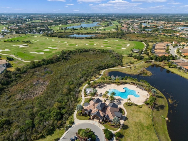 bird's eye view featuring a water view and view of golf course