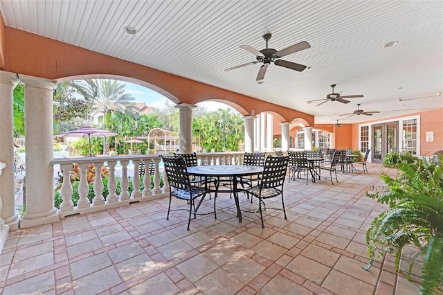 view of patio / terrace featuring outdoor dining area and ceiling fan