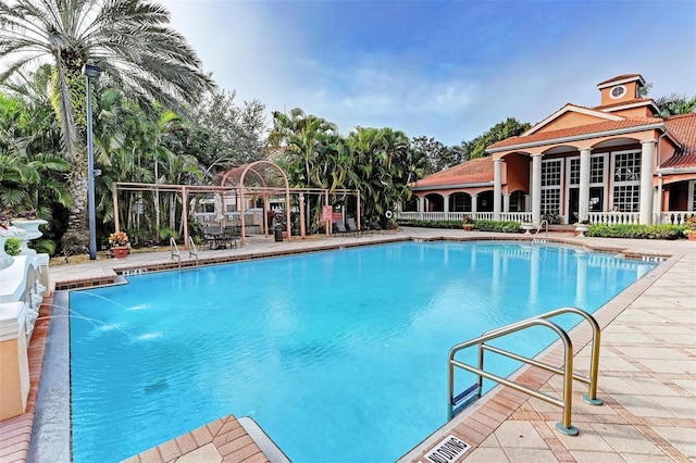 pool with a patio area