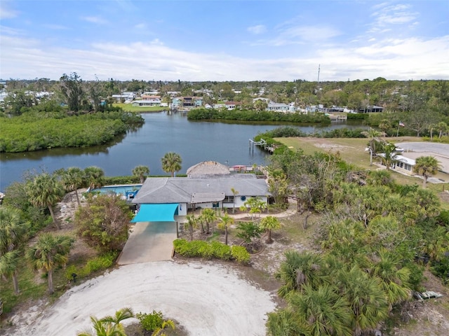 drone / aerial view with a water view