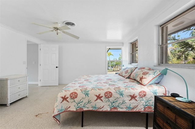 bedroom with visible vents, baseboards, ceiling fan, and ornamental molding