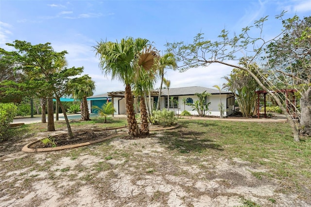 view of front of home featuring stucco siding