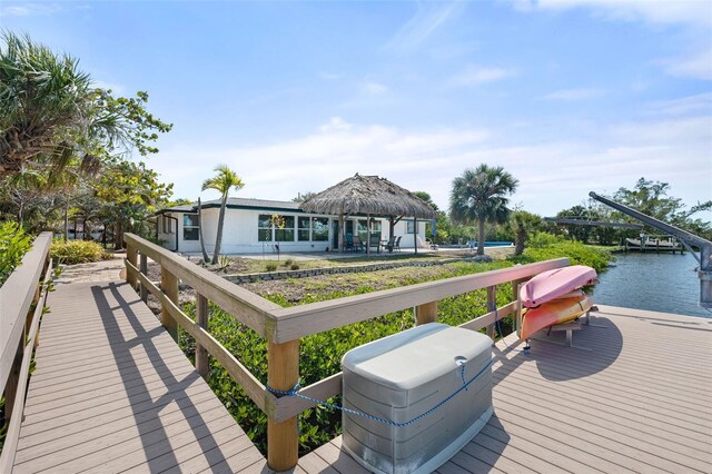 exterior space with a gazebo and a water view