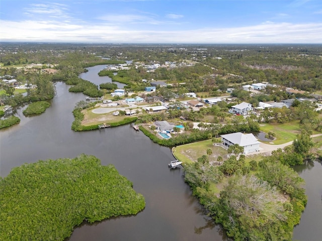 drone / aerial view featuring a residential view and a water view
