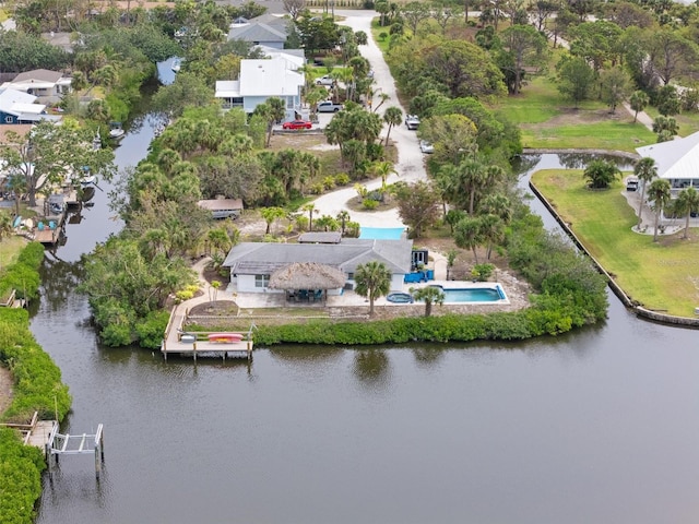 aerial view featuring a water view and a residential view