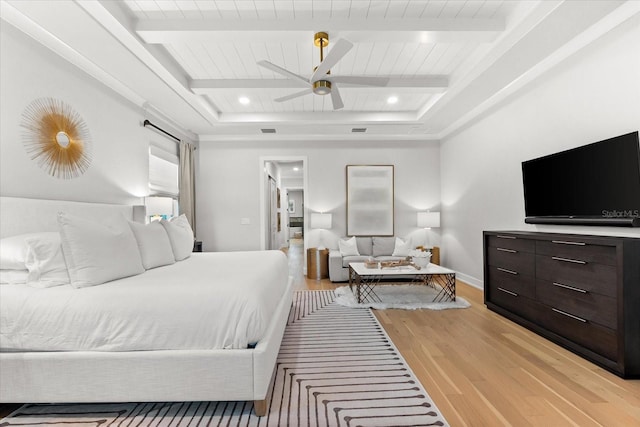 bedroom featuring recessed lighting, light wood-type flooring, beam ceiling, and baseboards