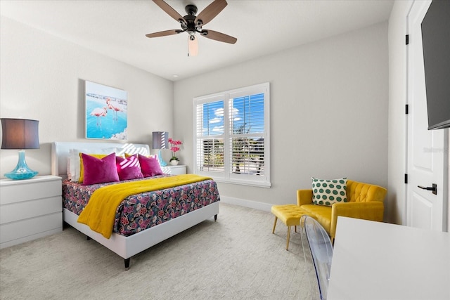 bedroom featuring carpet flooring, baseboards, and ceiling fan