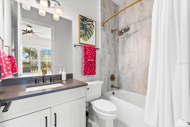 full bath with toilet, shower / bath combo with shower curtain, vanity, and a ceiling fan