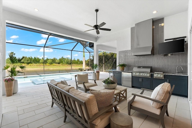 view of patio / terrace with area for grilling, an outdoor living space, a sink, glass enclosure, and exterior kitchen