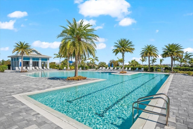 community pool featuring a patio area