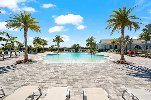 community pool featuring a patio area