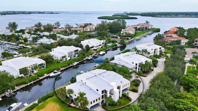 aerial view featuring a residential view and a water view