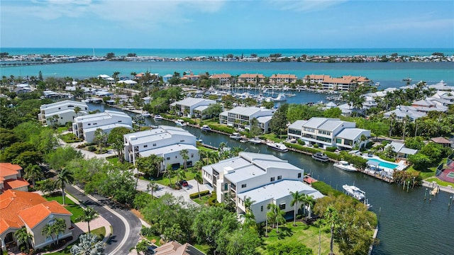 aerial view featuring a residential view and a water view