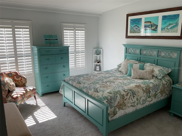 bedroom featuring light colored carpet and crown molding