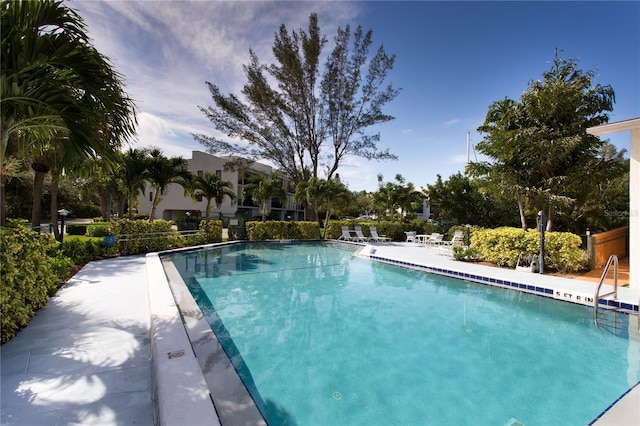 pool featuring fence