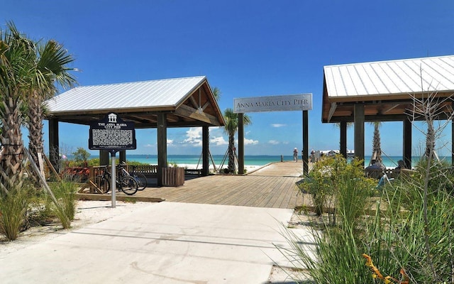 exterior space featuring a gazebo and a water view