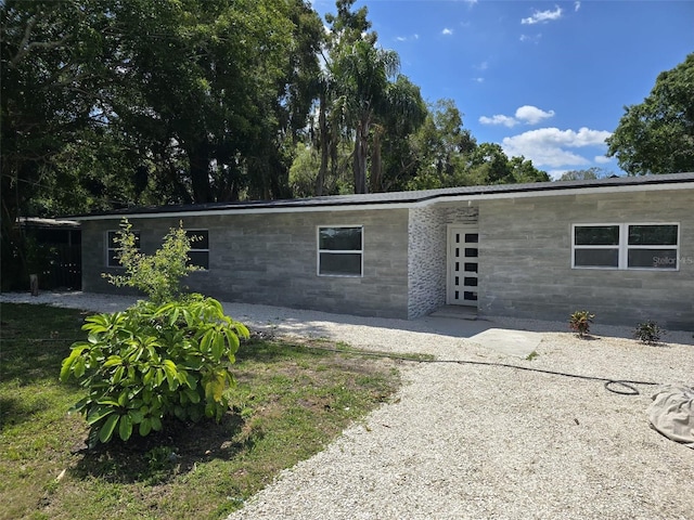 back of house featuring french doors