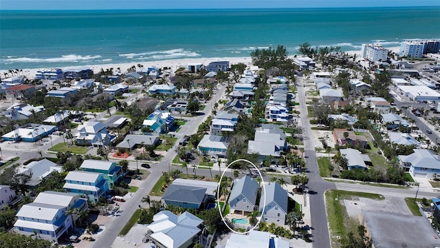 drone / aerial view with a residential view and a water view