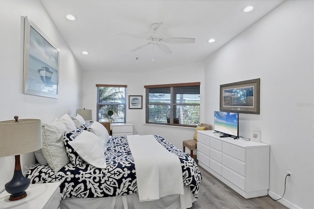 bedroom with recessed lighting, light wood-style flooring, baseboards, and ceiling fan