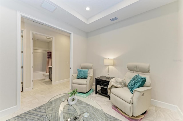 sitting room with recessed lighting, baseboards, and visible vents