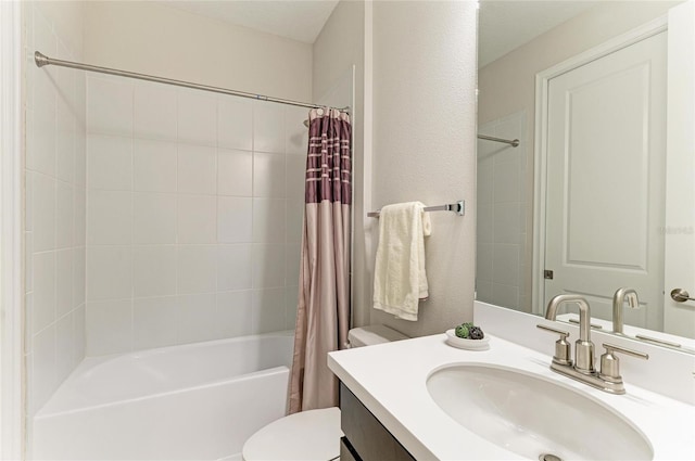 bathroom with vanity, toilet, and shower / tub combo