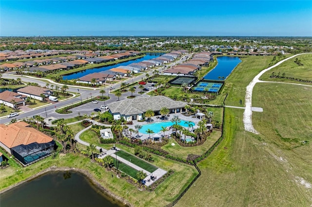 aerial view featuring a residential view and a water view