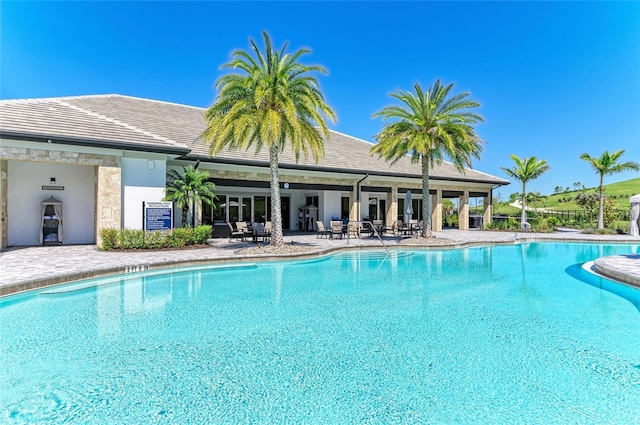 pool with a patio