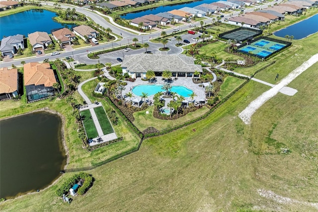 aerial view with a residential view and a water view